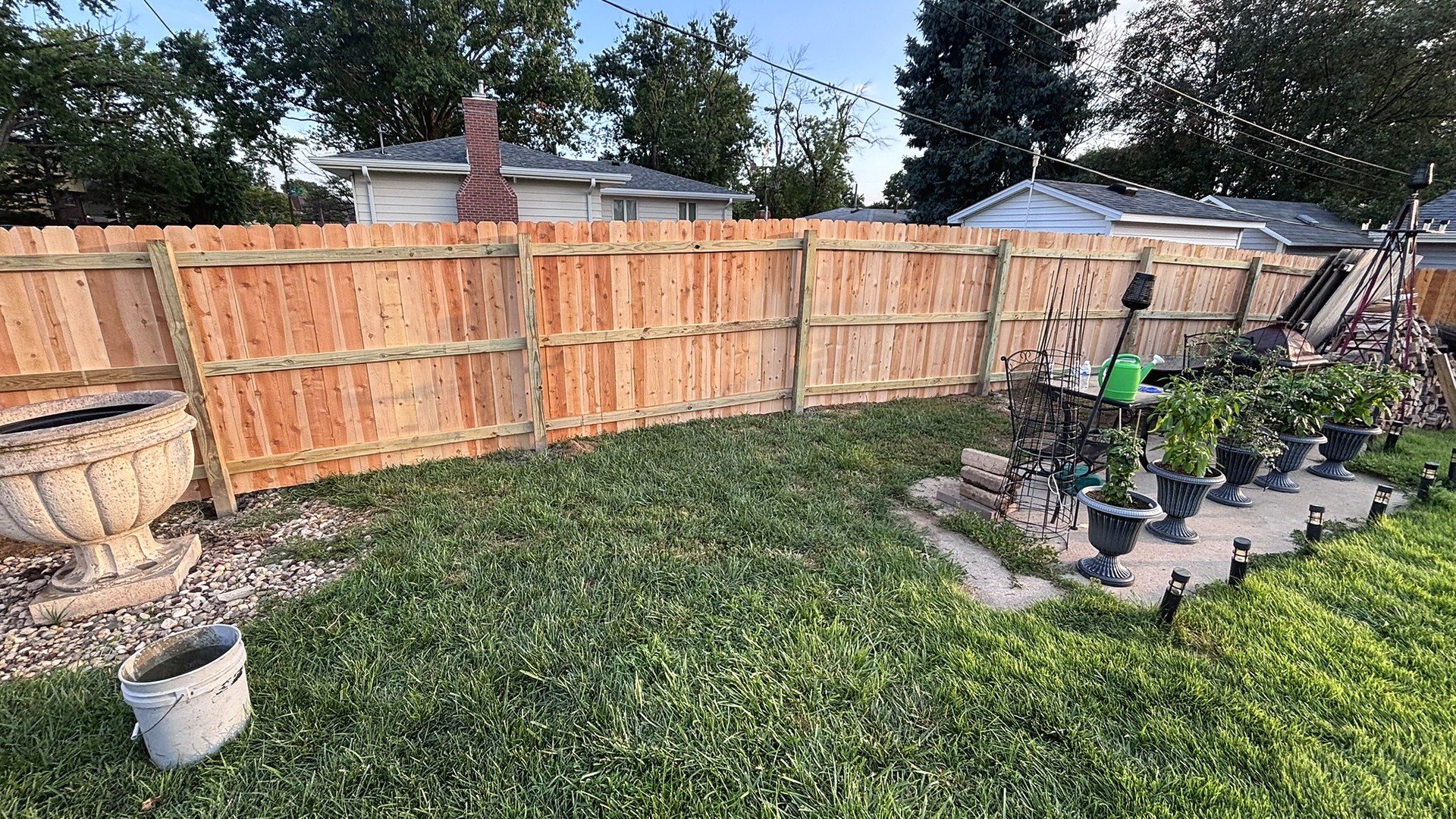 Cedar privacy fence at golden hour — ECS install